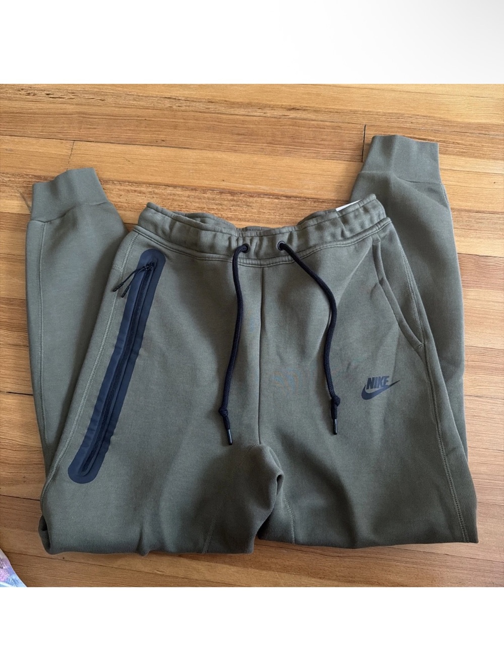 Nike Men's Olive Green Athletic Joggers with Zip Pocket